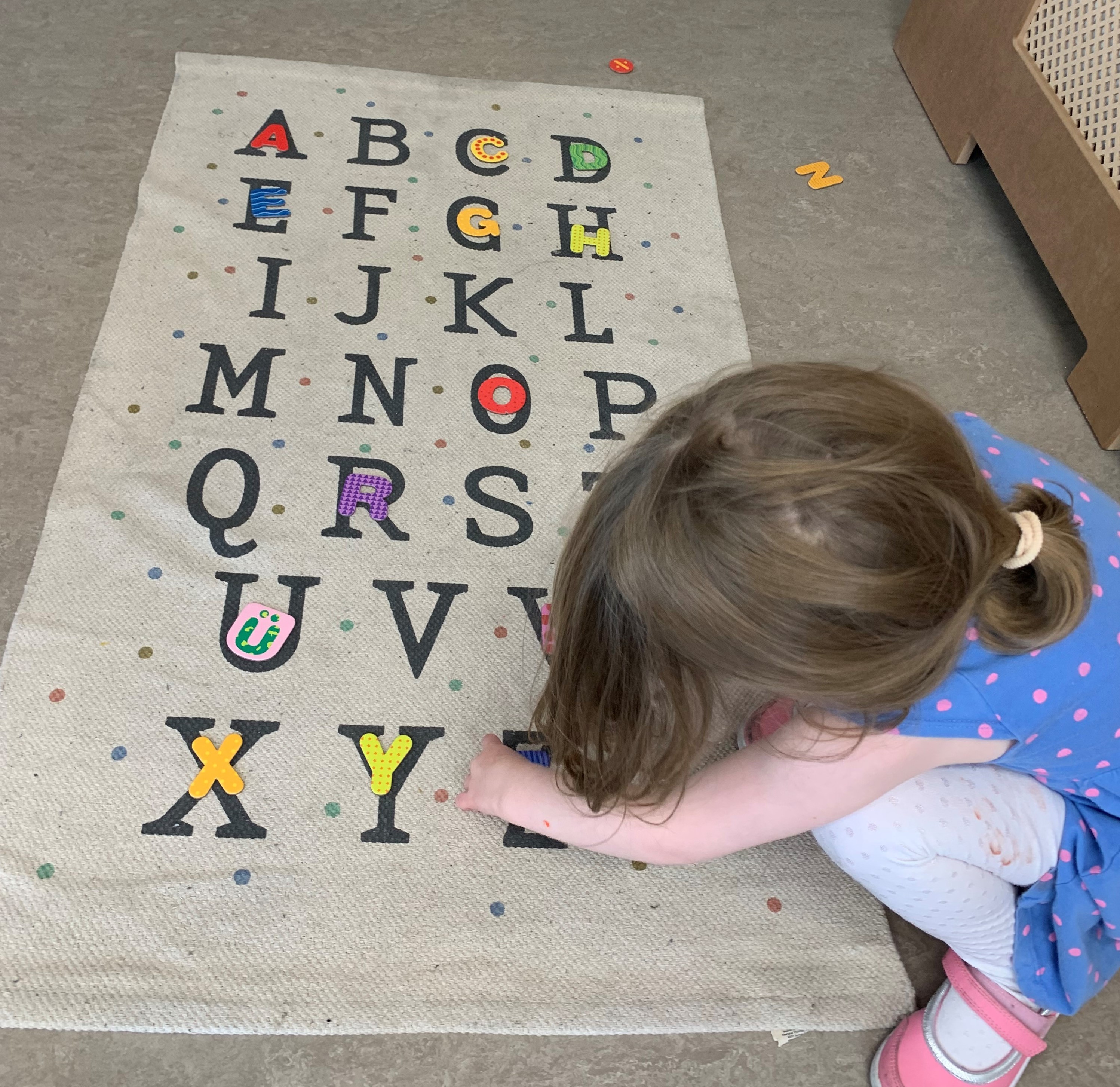 Preschool room alphabet rug